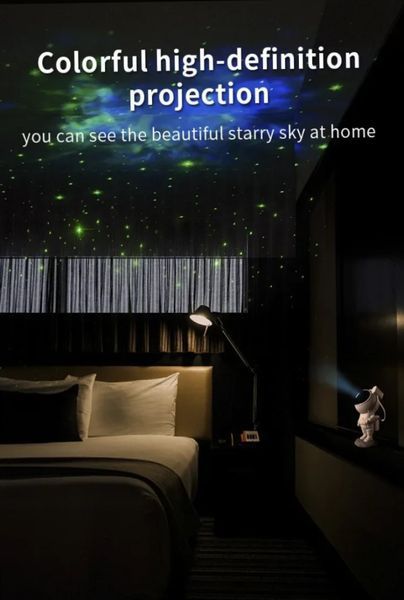 Дитячий нічник проєктор зоряного неба Астронавт Sky Star Astronaut Lamp нічник лазерний з пультом | HappyShop 1941 фото